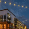 a building behind a string of lights