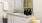 a bathroom with a mirror and sink